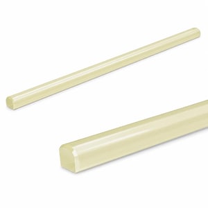 May include: Two long, slender, pale yellow glass rods with a smooth, translucent finish. Each rod features a rounded top surface and a flat bottom, creating a semi-circular profile. The rods are positioned diagonally across the frame.