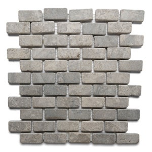 May include: A sheet of gray and white rectangular mosaic tiles. The tiles are arranged in a brick pattern.