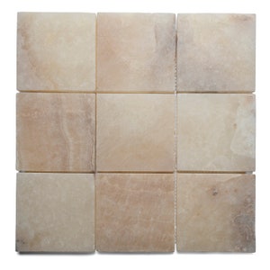May include: Nine square tiles made of light beige onyx with subtle veining. The tiles are arranged in a 3x3 grid.