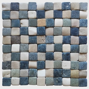 May include: A square mosaic tile pattern composed of small, rounded square tiles. The tiles are in shades of blue, beige, and gray, creating a natural, textured appearance. The arrangement is uniform, suitable for various design applications.