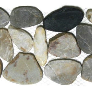 May include: A mosaic tile sheet featuring a collection of smooth, rounded river stones in various shades of gray, beige, and brown. The stones are arranged on a white mesh backing, creating a natural and textured surface suitable for interior design projects.