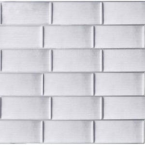 May include: Brushed silver metal tile panel with a brick pattern. The rectangular tiles are arranged in a staggered layout, creating a textured surface. The panel has a modern, industrial aesthetic.