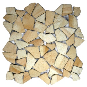 May include: A sheet of beige stone tile mosaic with irregular shapes, set on a black mesh backing.