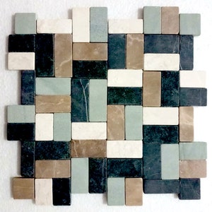 May include: A mosaic tile sheet with a random pattern of green, brown, white, and black rectangular tiles.