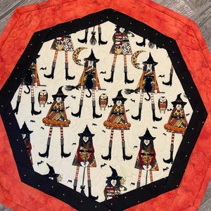 Witches and Bats Quilted Table Topper, is bursting with fun to decorate your table!
