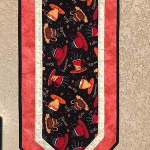 Cups and Saucers Table Runner will spruce up your table and get it ready for guests.  It measures 38”x15” and is ready to ship.