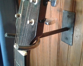 Hand Forged Iron Guitar Hanger Lined With Wear Reducing Clear Plastic Tubing