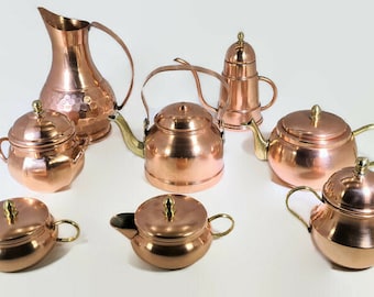 Set of 8  copper and brass objects  containers/pots (sugar bowl, milk holder , copper teapot, water jug, oil cruet etc.) Vintage set