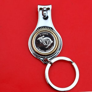 Canada 1967 Five Cents BU Uncirculated Coin Coin All-in-One Key Ring Bottle Opener Nail Cutter Clipper NEW - Bounding Snowshoe Rabbit