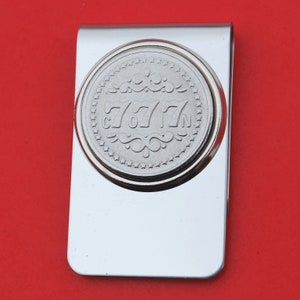 Ficha de juego de máquina tragamonedas auténtica Lucky 777 Moneda sin circular Clip para billetes de acero inoxidable Nuevo