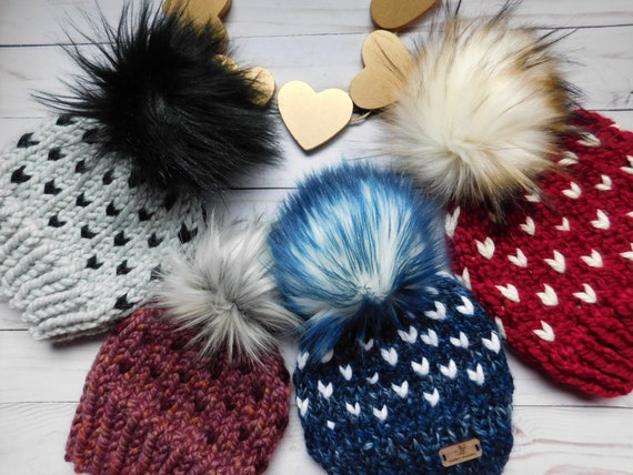 pink pineapple pom pom hat