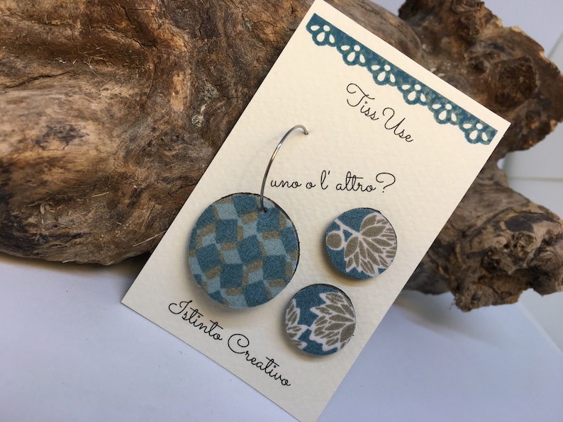 Three earrings you can choose wich one you wear. Wood and recycled fabric earrings