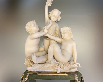 Antique German Bisque Porcelain Cherub Figurine: E & A Muller Blanc de Chine