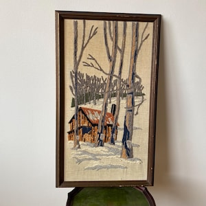 Vintage Crewel Gestickte Wand-Kunst-Winter-Szene Blockhaus-Ahornsirup Kanadische Folklore Fibreart Winter-Kanadier mit Rahmen