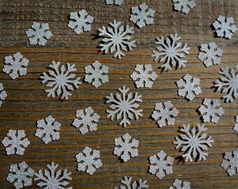 Stor och liten silverfärgad snöflingkonfetti