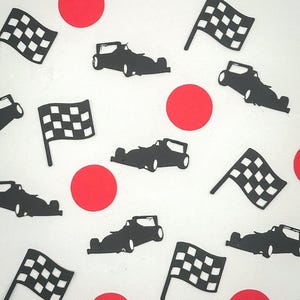 May include: A scattering of black race cars, checkered flags, and red circles on a white background. The race cars are in silhouette, and the flags have a black and white checkered pattern. The red circles are evenly spaced.