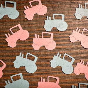 Confeti para revelar el género del bebé con tema de tractor rosa y azul