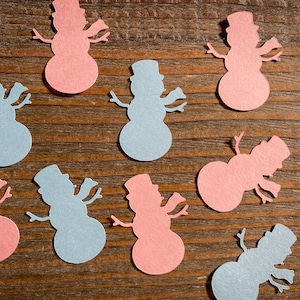 Confeti para fiesta de revelación de género de baby shower con muñecos de nieve rosas y azules