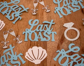 Last Toast on the Coast Confetti with Silver Engagement Rings