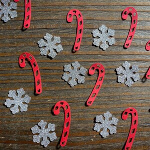 Zuckerstange und silbernes Schneeflocken Winter Party Confetti