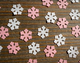 Rosa och vit snöflingkonfetti