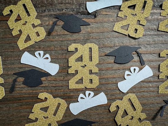 Glitter Gold 2026 Graduation Party Confetti with Black Caps and Diplomas Stacked Years