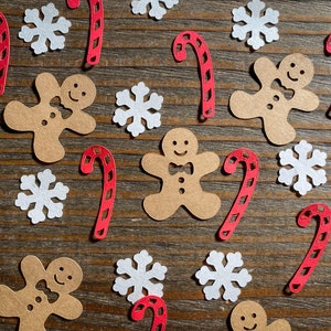 Zuckerstange, Lebkuchenmann und weiße Schneeflocke Winter-Geburtstagsparty Konfetti