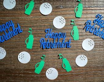 May include: Green and blue paper cutouts of golf bags and golf balls with the text "Happy Retirement" in blue.