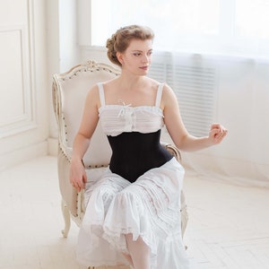 Corsé victoriano Underbust, corsé Underbust de algodón negro de la década de 1890