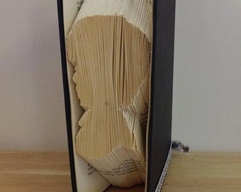 Book folding art pattern for a boy bust figurine