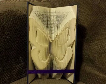Book folding art pattern for a butterfly