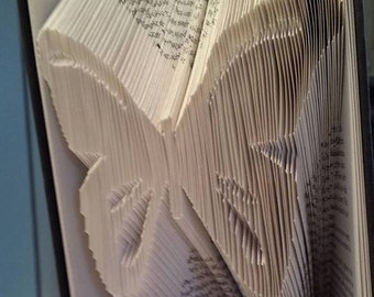 Book folding art pattern for a butterfly