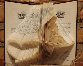 Book folding art heart with a butterfly