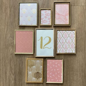 8 vintage gold table number frames; mismatched frames for wedding decor