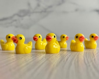 7 tiny yellow plastic duckies for fairy garden