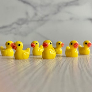 7 tiny yellow plastic duckies for fairy garden