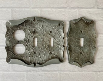 1970s Amerock Carriage House pair of pewter color switch plates