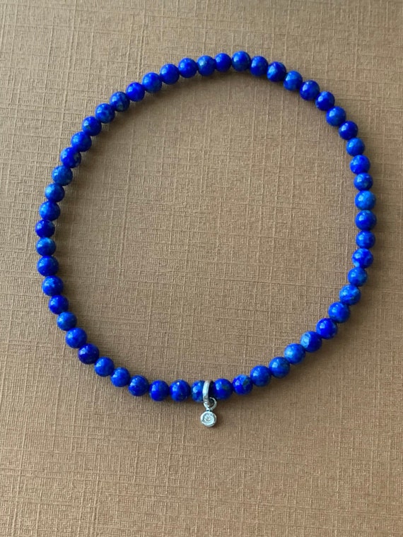 No import tariffs! 14k Solid Gold, Tiny Diamond, Blue Lapis Lazuli Stretch Bead Bracelet