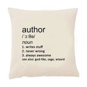 May include: A square, cream-coloured cushion featuring the word "author" and its definition in black text. The definition includes pronunciation, part of speech, and humorous traits: writes stuff, never wrong, and always awesome.