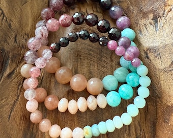 July Mala of the Month | Flirt Bracelet | Garnet, Strawberry Quartz, Ruby, Amazonite + Sunstone | Spiritual Junkies