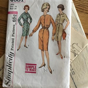 May include: Vintage Simplicity pattern 4681, featuring illustrations of three dresses. The pattern cover shows a woman in an orange dress with a belt. The text "SIMPLE TO MAKE" is printed on the cover. Size 14, Bust 34.