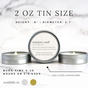 May include: Three small, silver-colored tin candles with lit wicks. The center candle has a label that reads "ministry staff" with a definition. The text "2 OZ TIN SIZE" and measurements of .8" height and 2.7" diameter are displayed. The burn time is 5-10 hours.