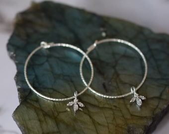 silver hoop earrings with tiny cubic zirconia charm 1 inch in diameter, lightweight silver hoops