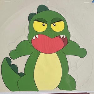 May include: A green cartoon dinosaur with yellow eyes and a red open mouth. The dinosaur has a yellow belly and is standing on a white background.