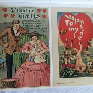 K&ouml;nnte beinhalten: Zwei Vintage-Valentinstagskarten. Die linke Karte zeigt eine Familienszene mit dem Text "Valentine Greetings". Die rechte Karte zeigt einen Engel, der ein Herz mit den Worten "To my Valentine" malt.