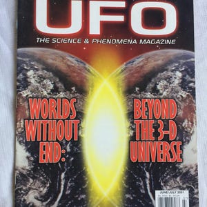 Puede incluir: Una portada de revista titulada UFO The Science & Phenomena Magazine, con el texto New Proof of Human Antiquity y Worlds Without End: Beyond the 3-D Universe. La portada muestra dos globos terr&aacute;queos separados por una luz amarilla brillante.