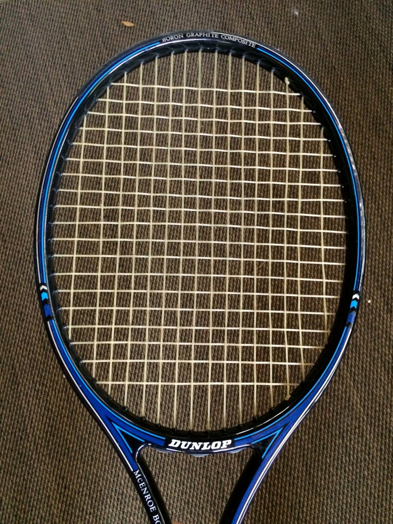 Raquette Dunlop McEnroe Bore Graphite – Manche 4 1/4 (occasion)