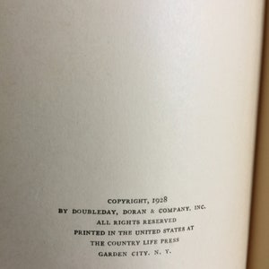 May include: Copyright information for a book published in 1928 by Doubleday, Doran & Company, Inc. The book was printed in the United States at The Country Life Press in Garden City, New York.