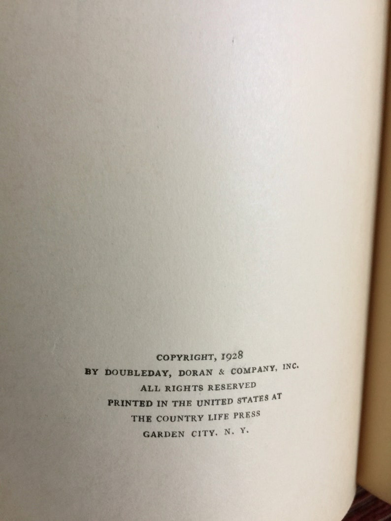 May include: Copyright information for a book published in 1928 by Doubleday, Doran & Company, Inc. The book was printed in the United States at The Country Life Press in Garden City, New York.