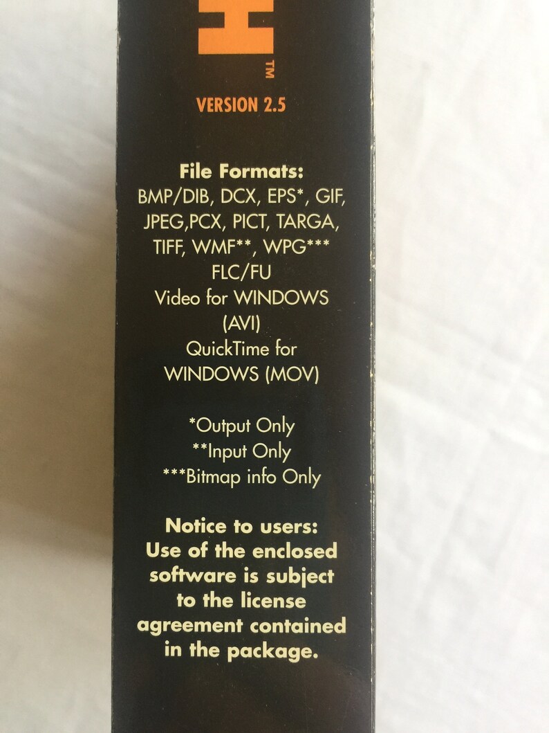 May include: Black and gold box with the text "H" and "VERSION 2.5" on the top. The box lists file formats supported by the software, including BMP, DIB, DCX, EPS, GIF, JPEG, PCX, PICT, TARGA, TIFF, WMF, WPG, FLC, FU, AVI, and MOV. The box also includes a notice to users about the license agreement contained in the package.